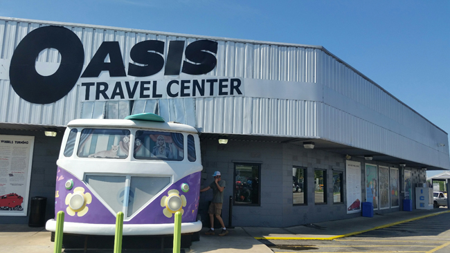 Oasis Travel Center-VW Bug Hooked onto Front of LocationJI.jpg